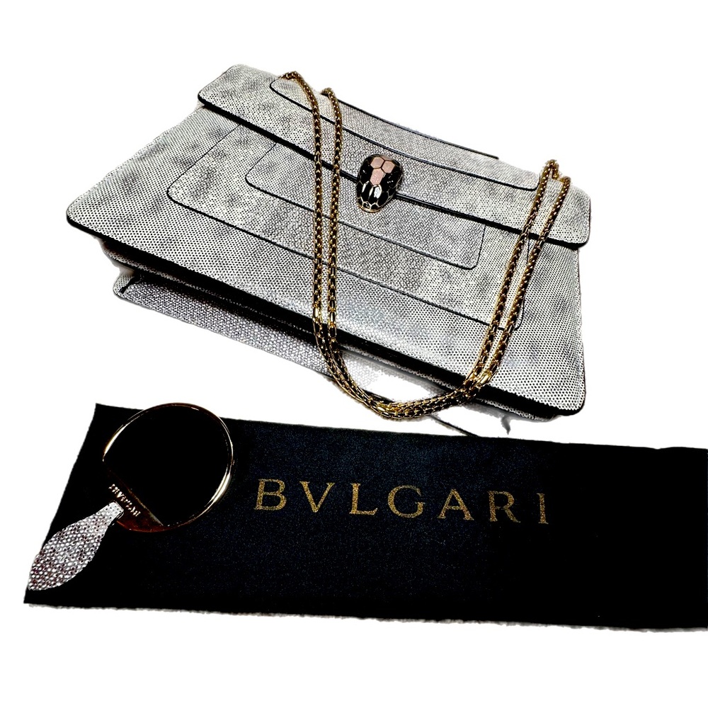 Beautiful bag. Used once at a dinner party. Include dust bag and small mirror.